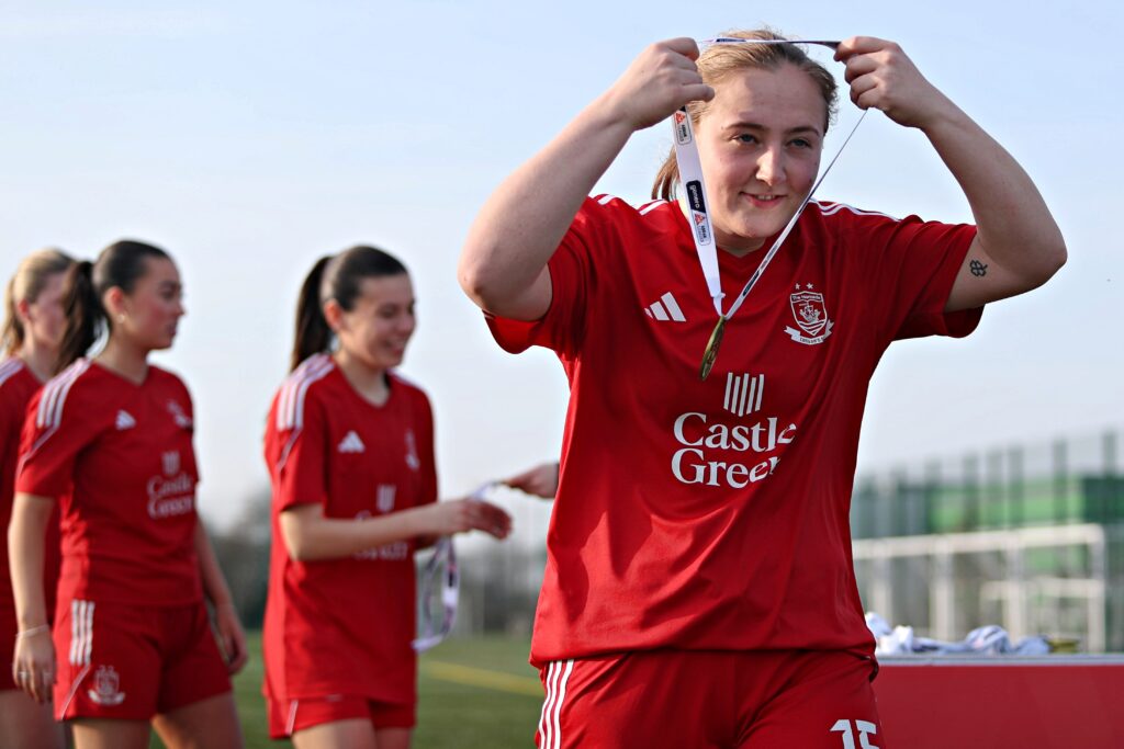 Evie Chard of Connah's Quay Nomads Women receives her medal after Connah's Quay Nomads Women vs NFA FC Women in Round 12 of the Genero Adran North at the Quay 3G, Connah's Quay