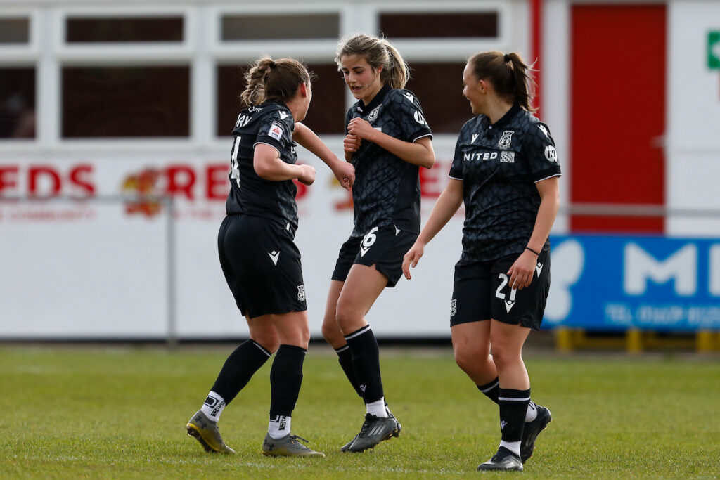 Ava Suckley of Wrexham AFC Women celebrates after scoring during the 2024/25 Genero Adran Premier league fixture between Briton Ferry Llansawel Ladies and Wrexham AFC Women at  Old Road Welfare Ground, Neath, Wales