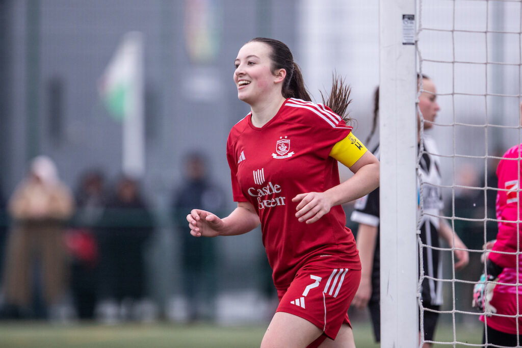 Connah's Quay Nomads' Polly Wild-McGregor makes it 7-1 and completes her hat-trick during the Genero Adran North fixture between Connah's Quay Nomads Women and Llandudno Ladies at The Poppies 3G, Connah's Quay. 2nd of February, Connah's Quay, Wales