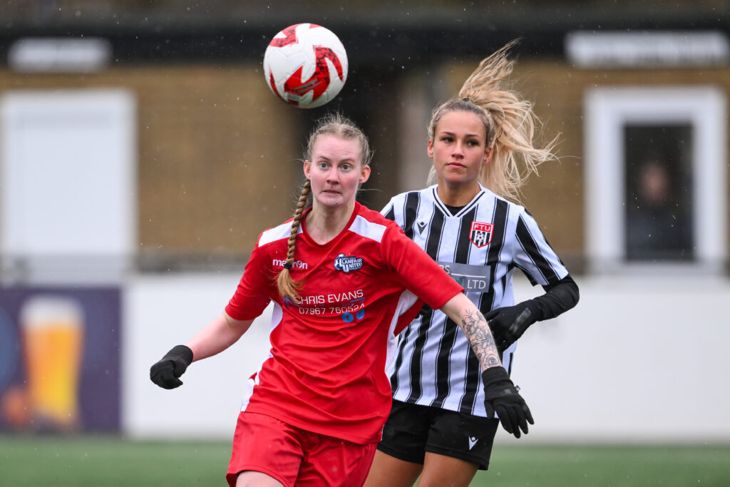 Llanfair United Womens' Paris Schofield makes a break with the ball during the 2024/25 Genero Adran North fixture between Flint Town United Women v Llanfair United Women at Essity Stadium, Flint, Wales