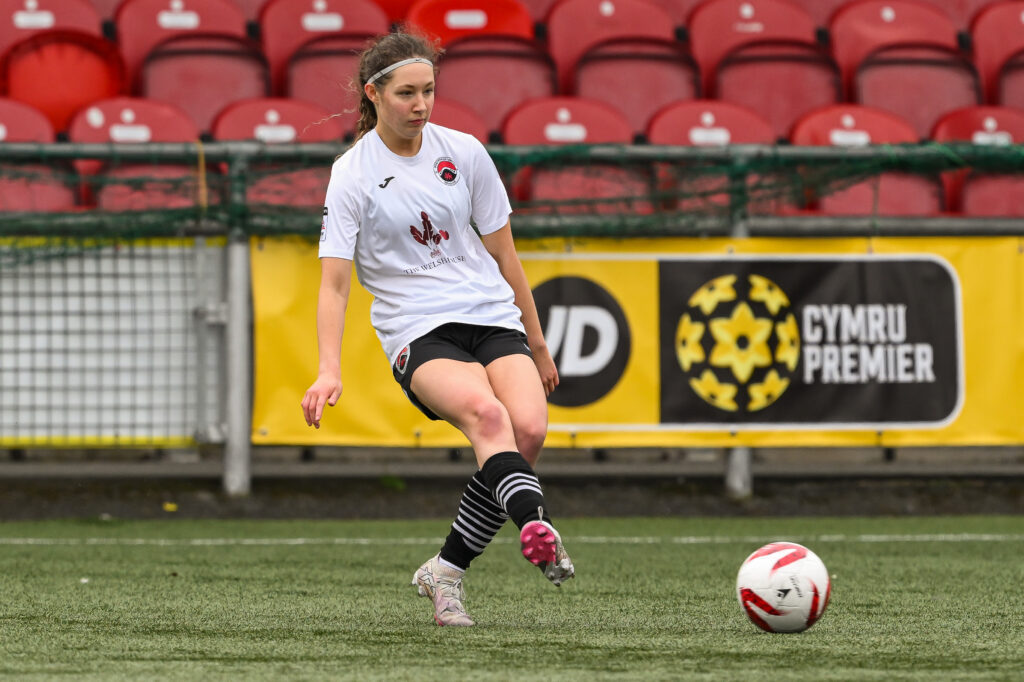 Lauren Payne of Pontypridd United women Ffion Evans of Pontypridd United women during the Bute Energy Welsh Cup 2024/25 Semi-Final fixture between Wrexham Women v Pontypridd United Women at Latham Park, Newtown, Wales